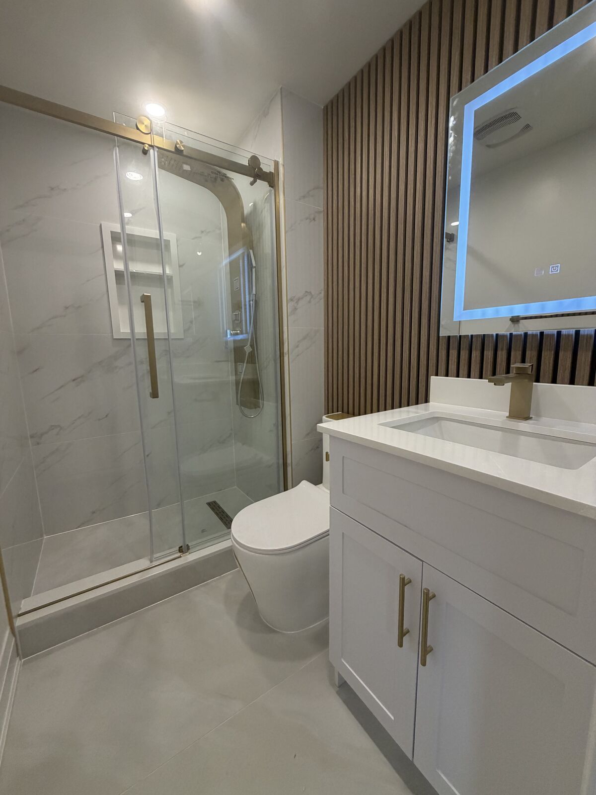 Backlit Mirror & Wood Accent Wall